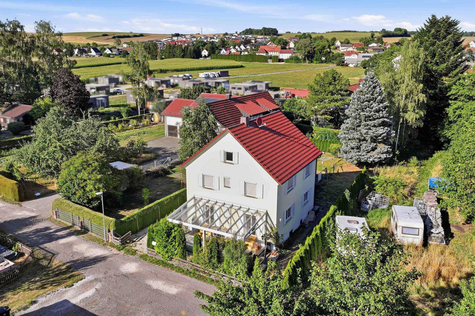 Durchdacht! Zweifamilienhaus mit Sommergarten und viel Potenzial